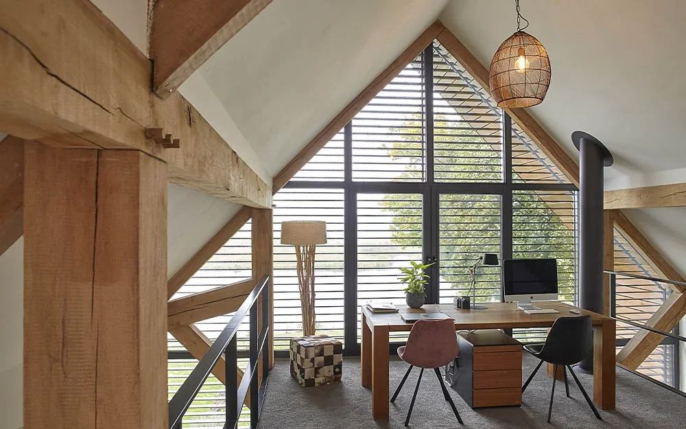 External tiltable louvres fitted to an architect-designed window